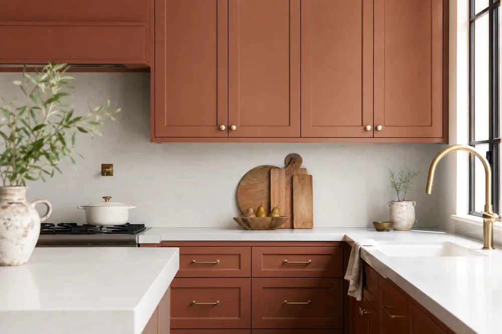 Freshly painted kitchen cabinets in warm terracotta